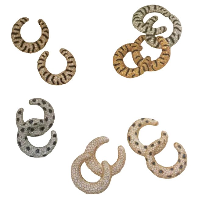 Boucles d'oreilles Créoles CARTIER "Panthère" en platine, saphirs et diamants - Castafiore