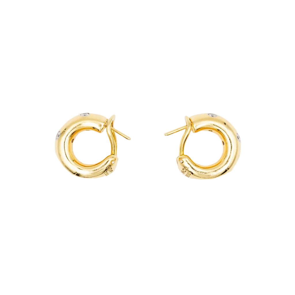 Boucles d'oreilles Créoles TIFFANY & CO. "Etoiles" en or jaune, platine et diamants - Castafiore