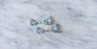 Boucles d'oreilles Gouttes Topaze Bleue et Diamant sur Or Blanc - Castafiore