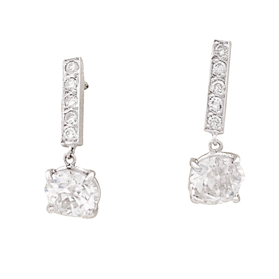Boucles d'oreilles or blanc, diamants. - Castafiore
