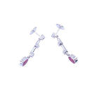 Boucles d'oreilles Pendantes en or blanc, rubis, et diamants - Castafiore