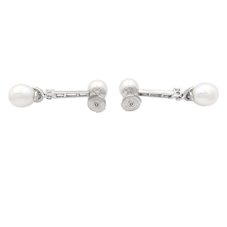 Boucles d'oreilles perles, diamants, platine, or blanc. - Castafiore