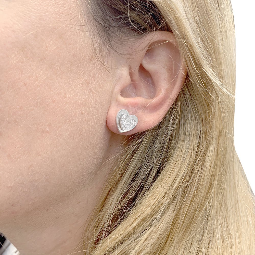 Boucles d'oreilles PIAGET "Coeur" en or blanc et diamants - Castafiore