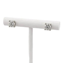 Boucles d'oreilles Puces CARTIER "Double C" en or blanc et diamants - Castafiore