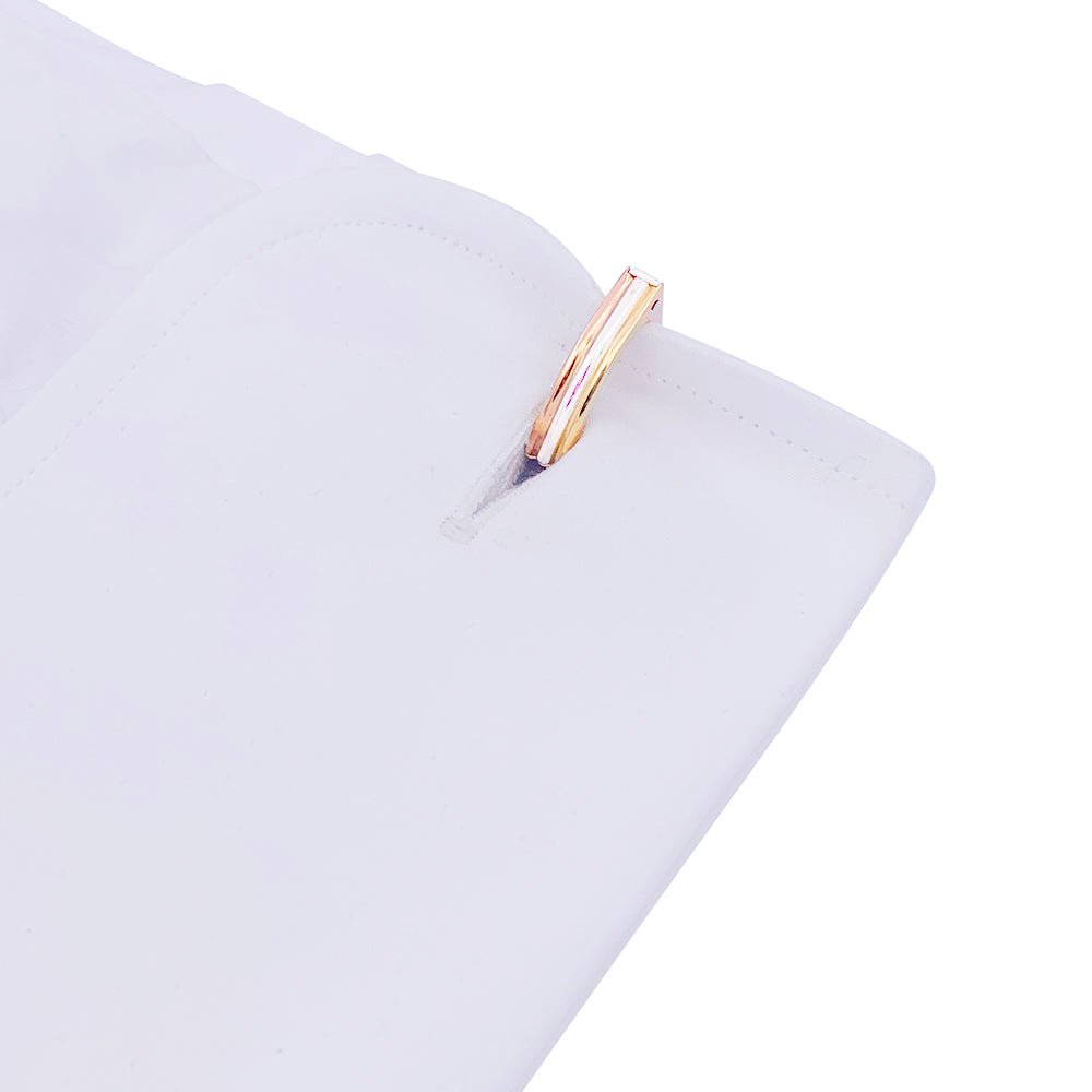 Boutons de manchette Cartier, trois ors. - Castafiore