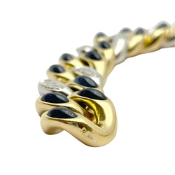 Bracciale oro 18KT con diamanti naturali e pietre blu, firmato POMELLATO. - Castafiore