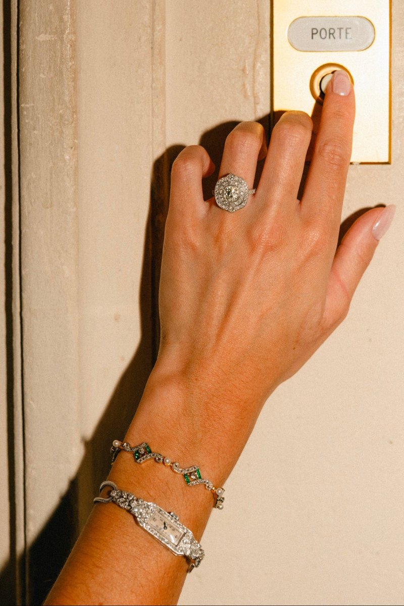Bracelet Art Deco en or jaune, platine, perles, émeraudes et diamants - Castafiore