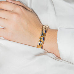Bracelet BOUCHERON en or jaune, saphir et diamants - Castafiore
