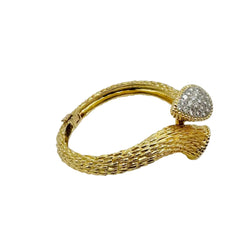 Bracelet BOUCHERON "Serpent bohème" en or jaune et diamants - Castafiore