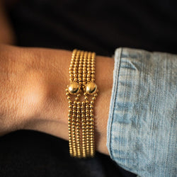 Bracelet CARTIER "Draperie" en or jaune 18k - Castafiore