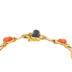 Bracelet CARTIER en or jaune, onyx et corail - Castafiore