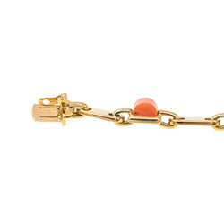 Bracelet CARTIER en or jaune, onyx et corail - Castafiore