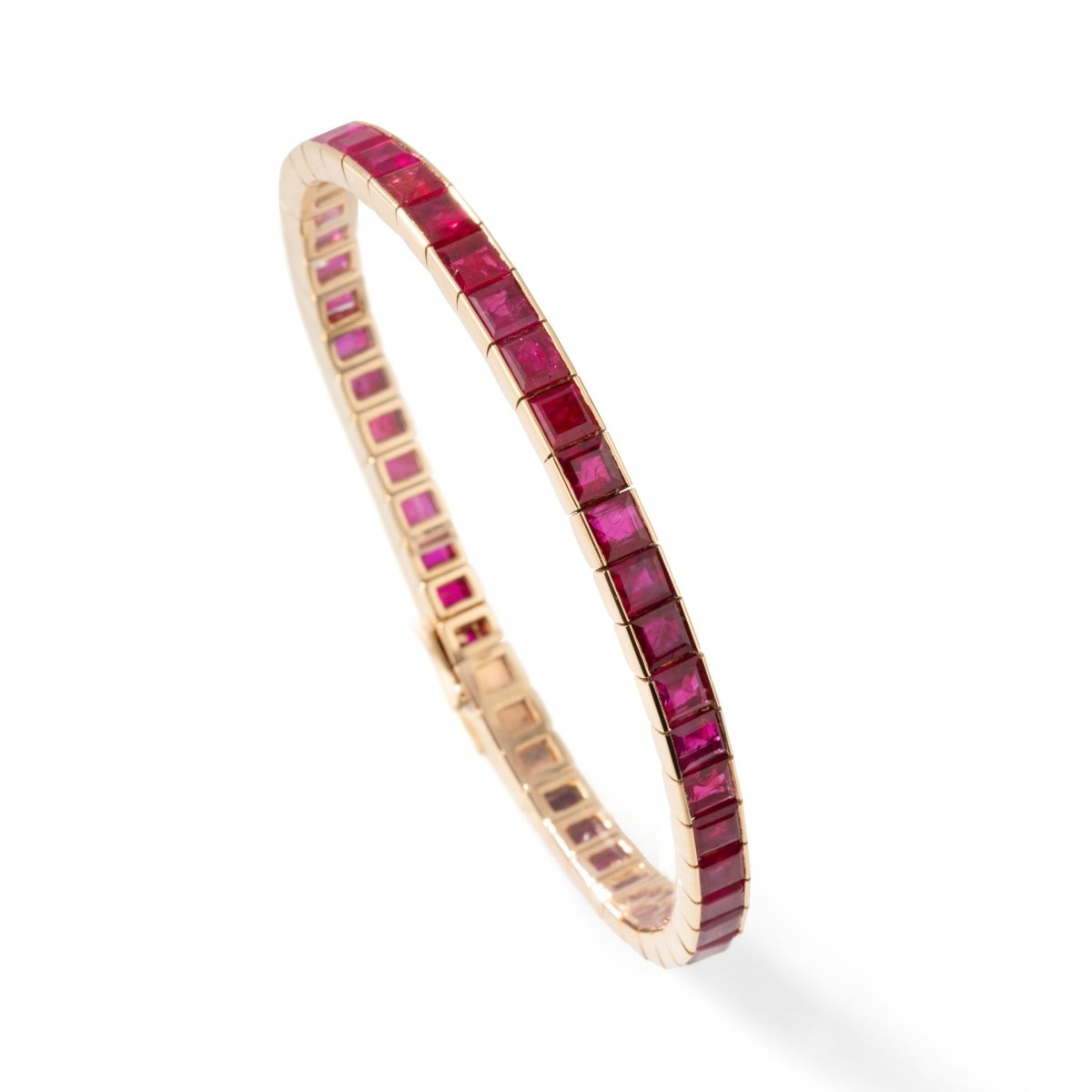 Bracelet CARTIER Ligne tennis en or jaune et rubis - Castafiore