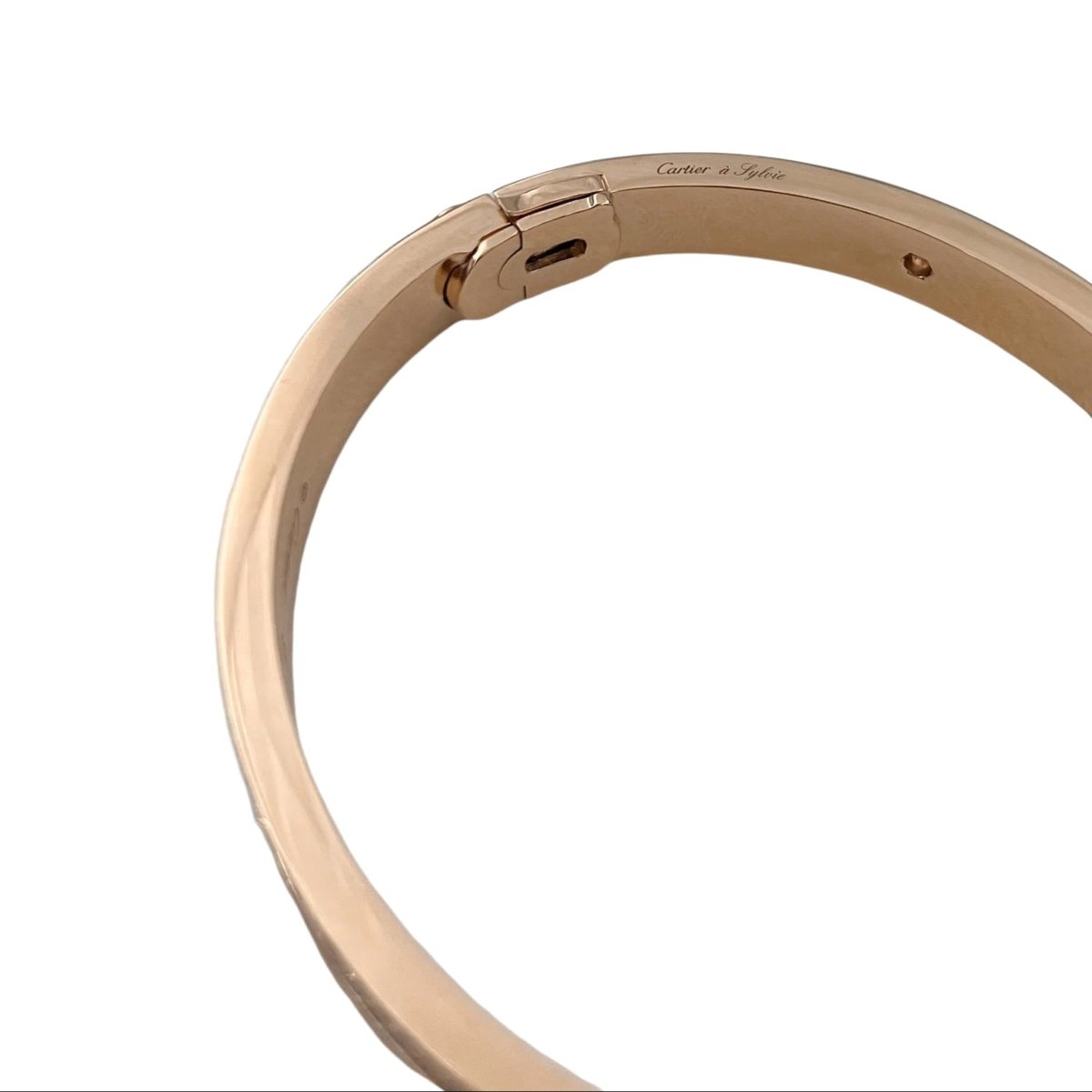 Bracelet CARTIER "Love" Modèle Classique Pavé en or rose et diamants - Castafiore