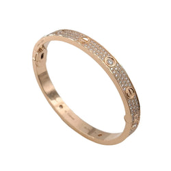Bracelet CARTIER "Love" Modèle Classique Pavé en or rose et diamants - Castafiore