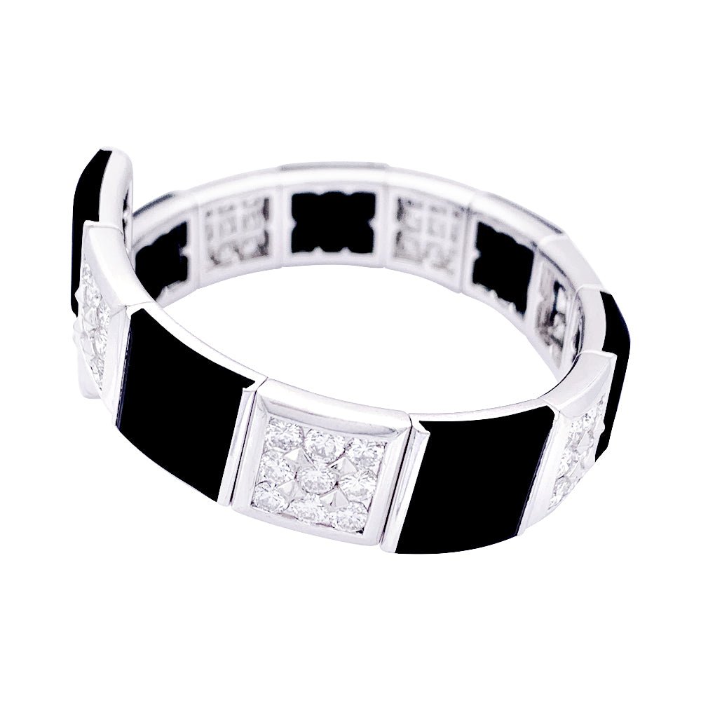 Bracelet CHANEL, "Harmonie", or blanc, diamants et onyx - Castafiore
