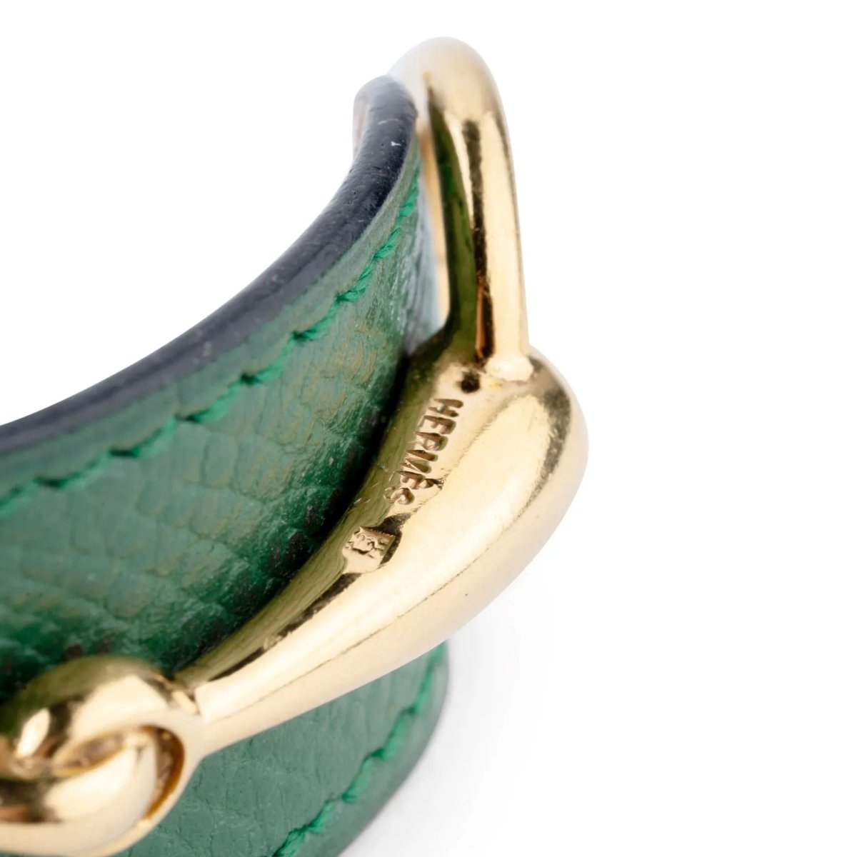 Bracelet de la maison Hermès en cuir et métal doré - Castafiore