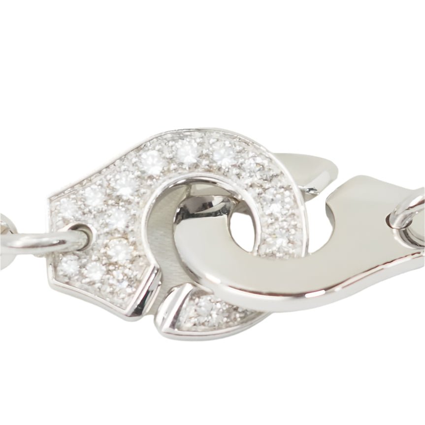 Bracelet DINH VAN Menottes R12 en or blanc et diamants - Castafiore