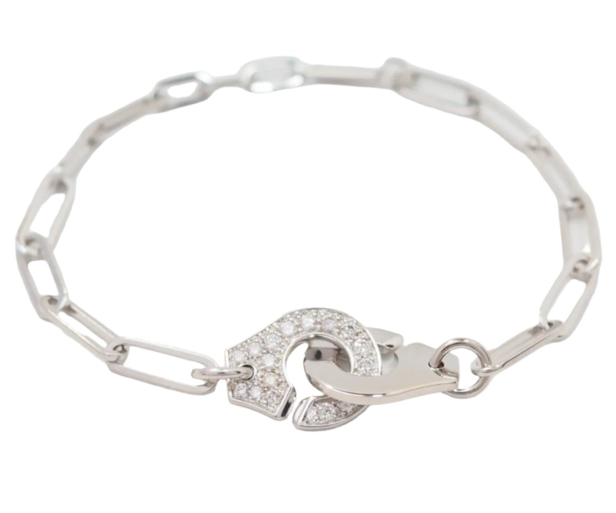 Bracelet DINH VAN Menottes R12 en or blanc et diamants - Castafiore