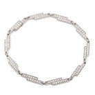 Bracelet DINH VAN "Seventies" en or blanc et diamant - Castafiore