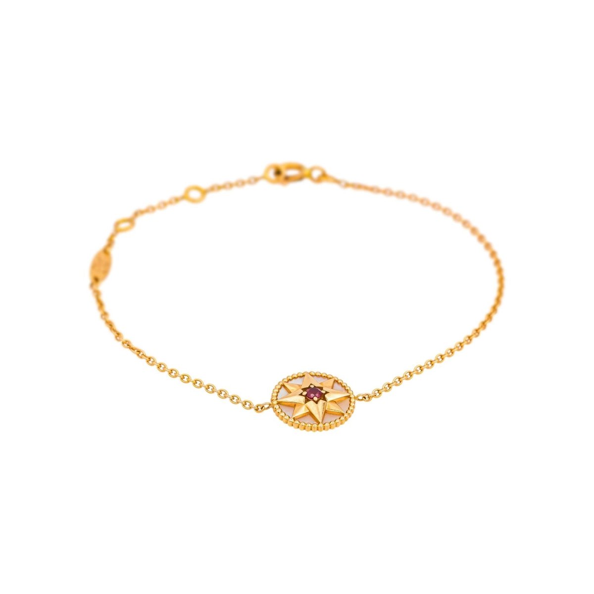 Bracelet DIOR "Rose des vents" en or jaune, nacre et rubis - Castafiore