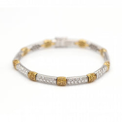 Bracelet en or bicolore 18K avec diamants et saphirs bleus - Castafiore