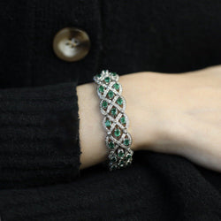 Bracelet en Or gris 18 Cts avec Diamants et émeraudes vers 2000. - Castafiore