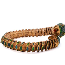 Bracelet en or jaune, émail, rubis et diamants - Castafiore