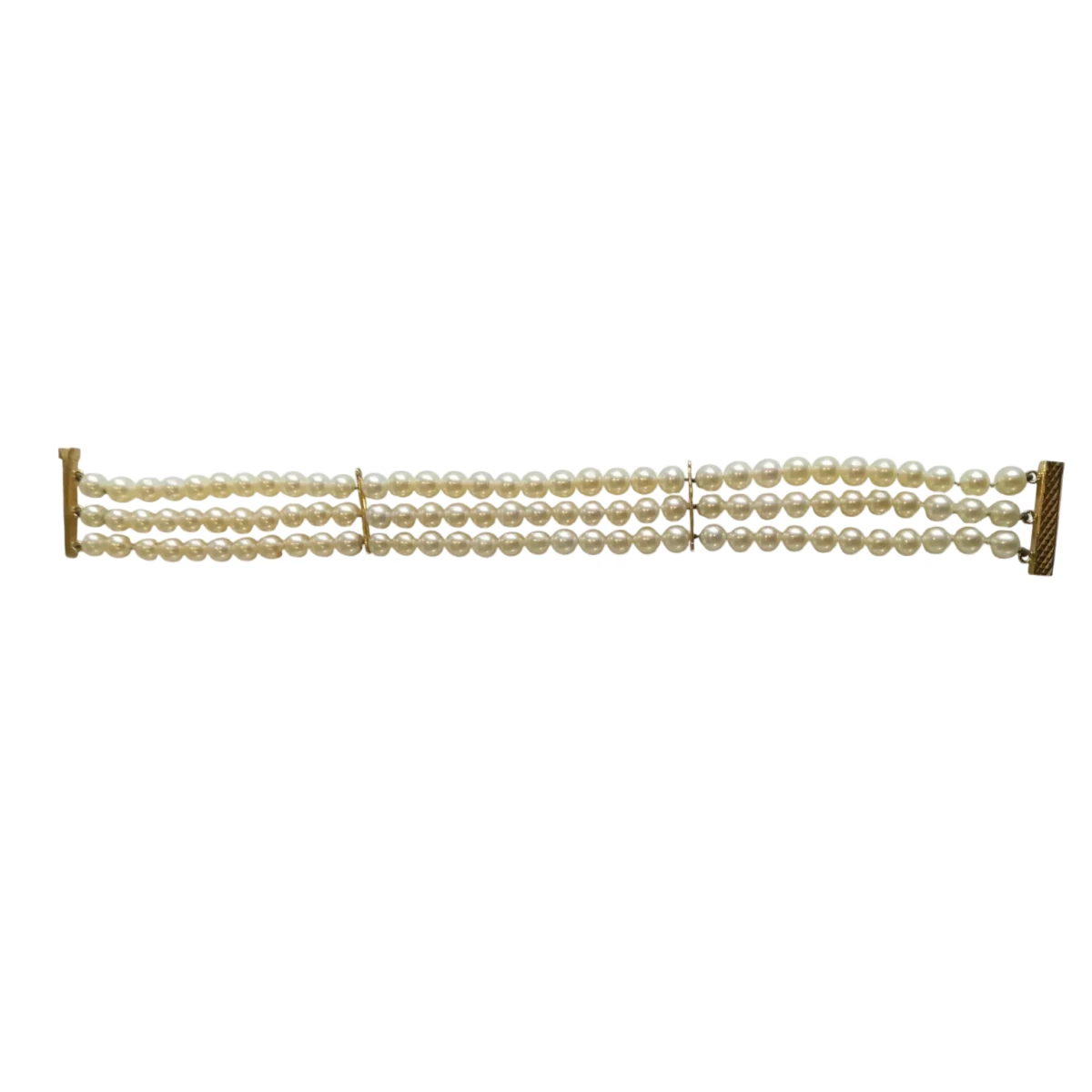 Bracelet en or jaune et perles - Castafiore