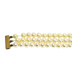 Bracelet en or jaune et perles - Castafiore