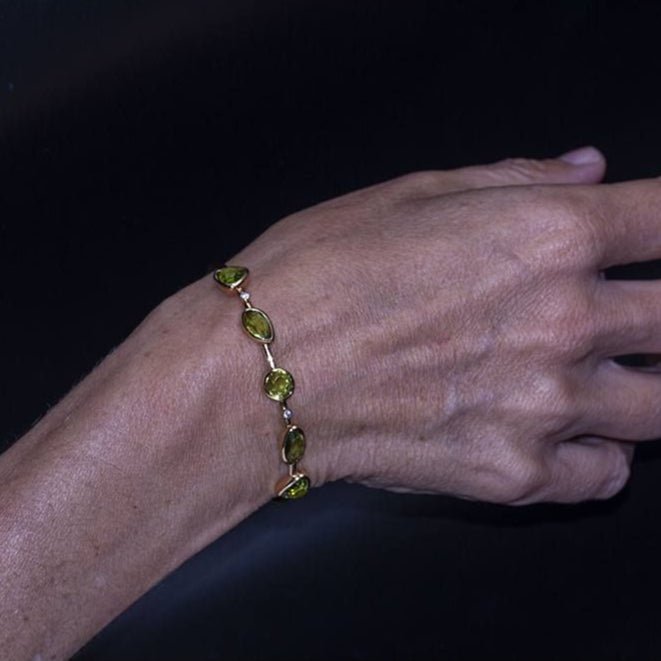 Bracelet en or jaune, péridot et diamants - Castafiore