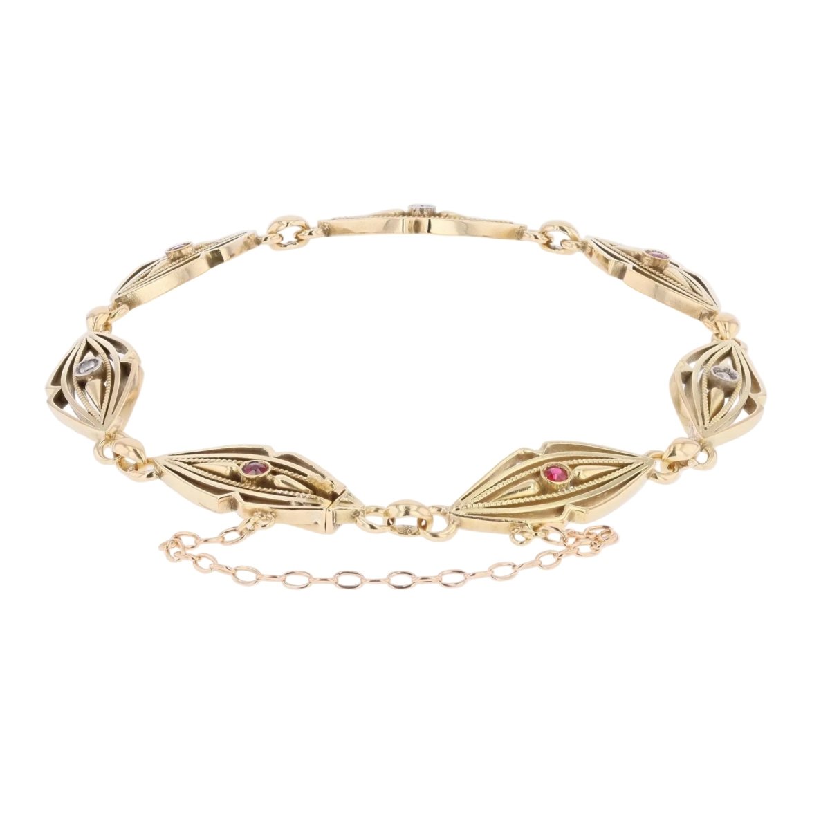 Bracelet en or jaune, rubis et diamants - Castafiore