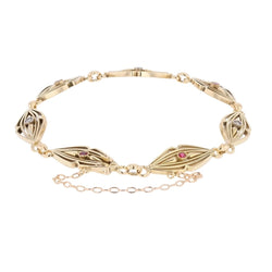 Bracelet en or jaune, rubis et diamants - Castafiore