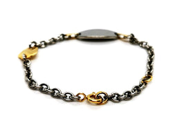 Bracelet gourmette en or jaune et or blanc - Castafiore