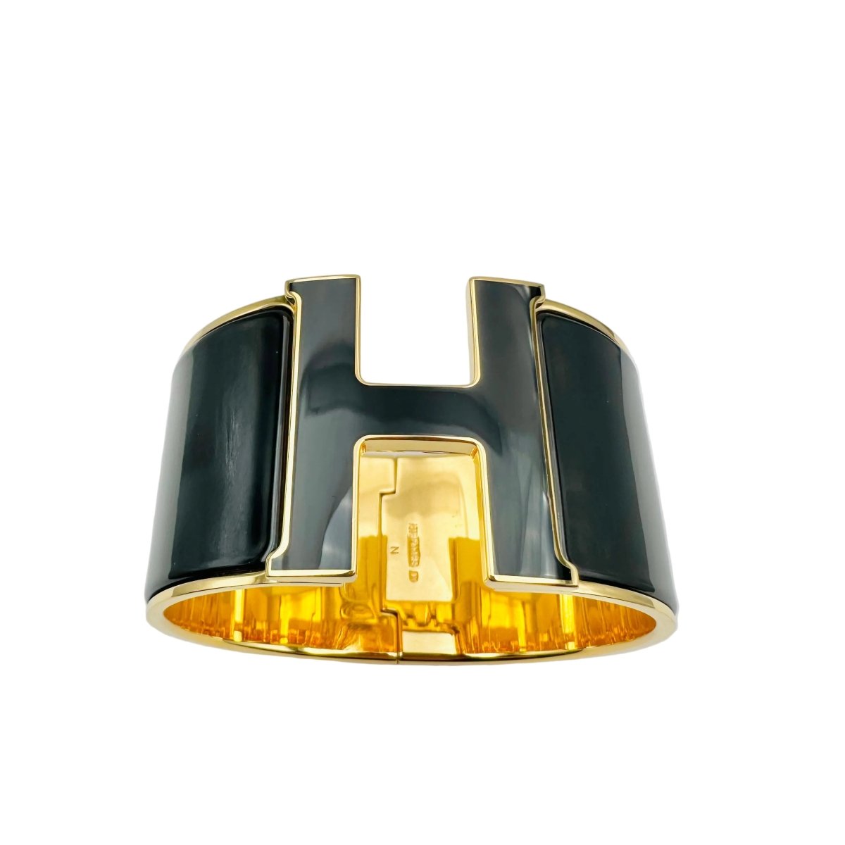 Bracelet HERMÈS Clic Clac H en métal doré et émail - Castafiore