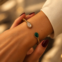 Bracelet Jonc BOUCHERON "Serpent Bohème" en or jaune, malachite et diamants - Castafiore