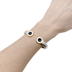 Bracelet Jonc BULGARI "Bulgari - Bulgari" en or jaune, acier et onyx - Castafiore