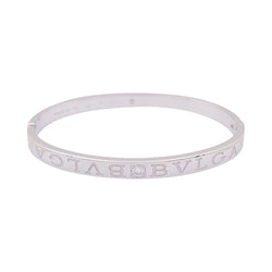 Bracelet jonc Bulgari "Bulgari Bulgari" or blanc, diamants. - Castafiore
