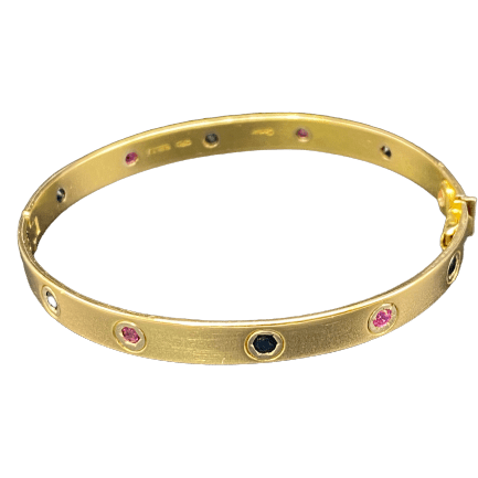 Bracelet Jonc CARTIER "Love Passion" en or jaune, rubis et saphirs - Castafiore
