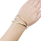 Bracelet Jonc Cartier "Trinity" en trois ors. - Castafiore