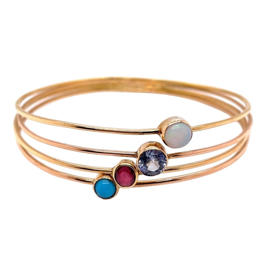 Bracelet Jonc en or jaune, opale, saphir, rubis et turquoise - Castafiore