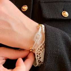 Bracelet Jonc en or jaune, or blanc et diamants - Castafiore