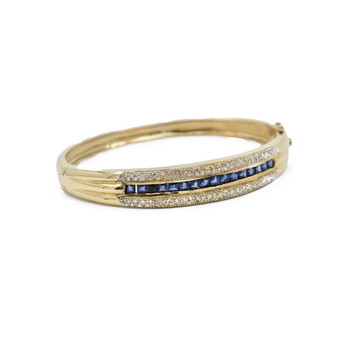 Bracelet Jonc en or jaune, or blanc et saphirs - Castafiore