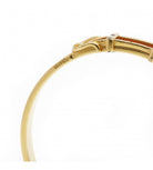 Bracelet Jonc HERMÈS "boucle de ceinture", or jaune et cuir - Castafiore