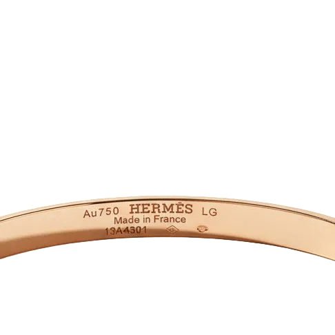 Bracelet Jonc HERMÈS "Kelly" PM en or rose et diamants - Castafiore