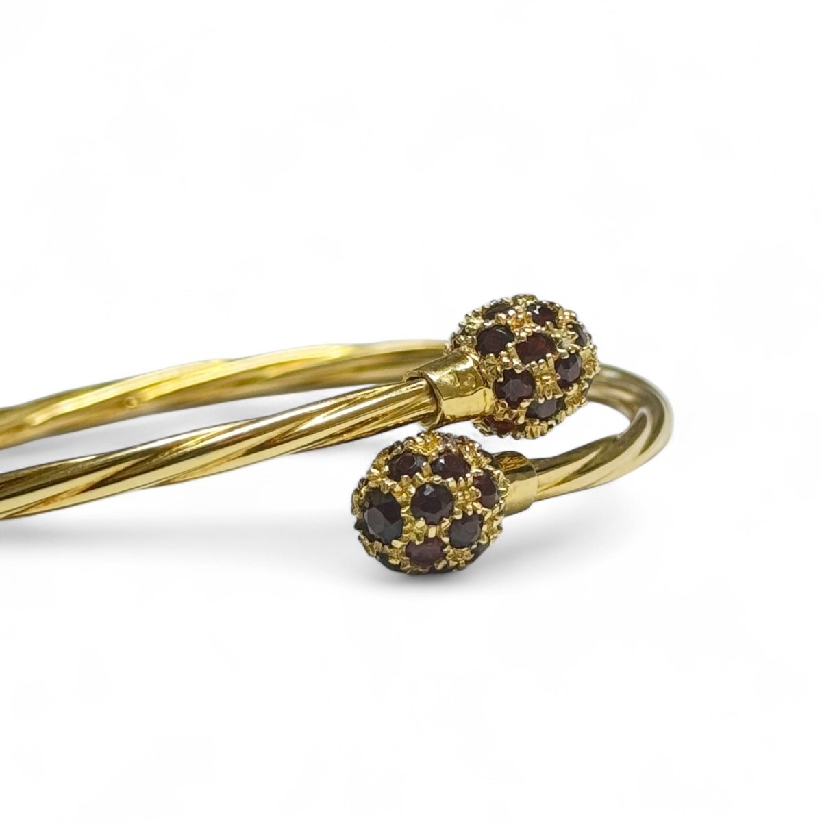 Bracelet jonc ouvert en or jaune et grenats - Castafiore
