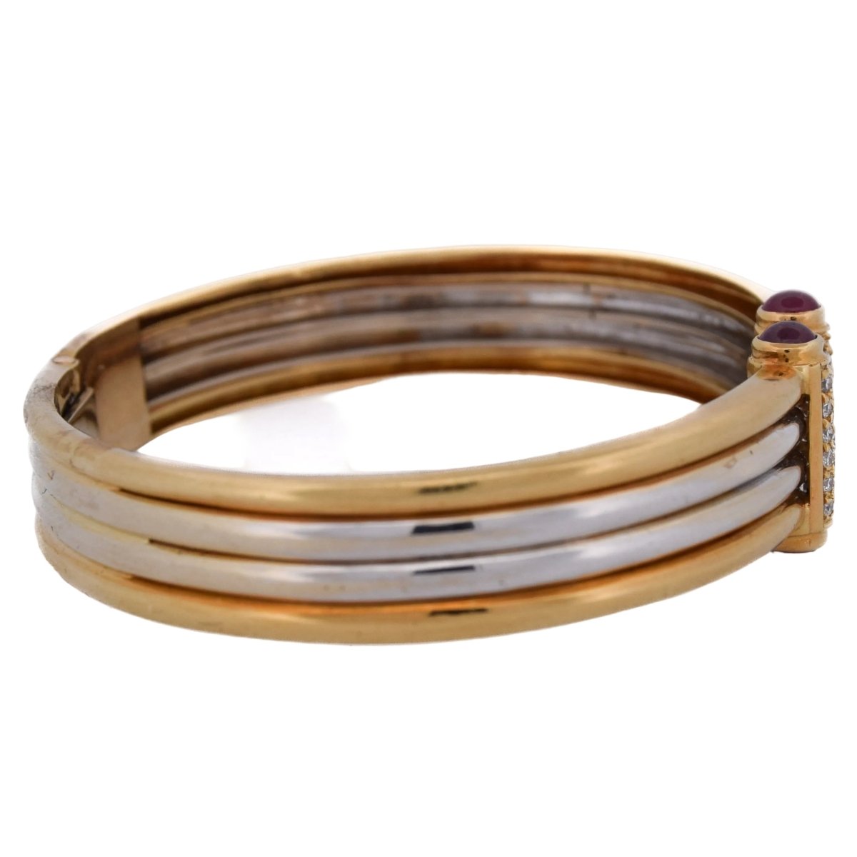 Bracelet Jonc PIAGET en or jaune, rubis et diamants - Castafiore