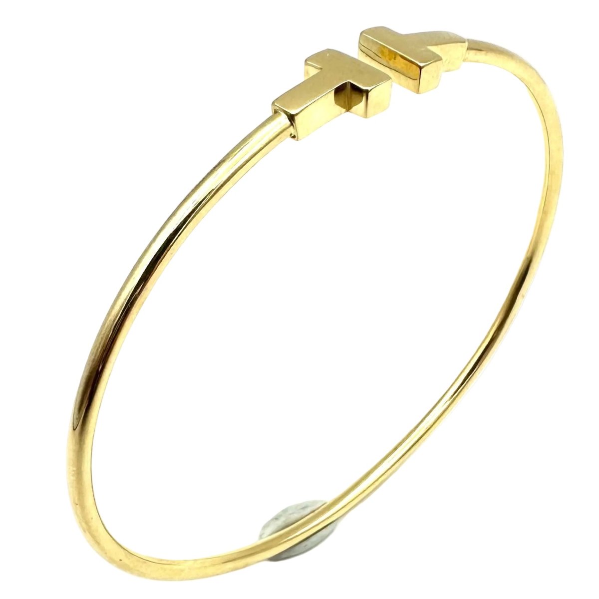 Bracelet Jonc TIFFANY & CO. "Tiffany T" en or jaune - Castafiore
