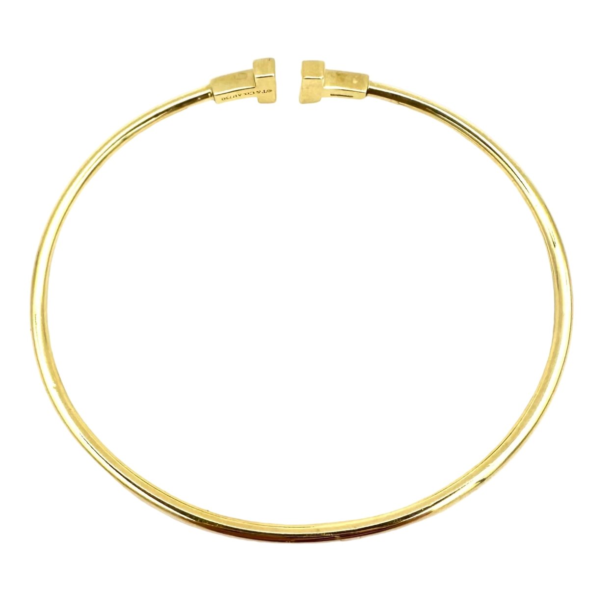 Bracelet Jonc TIFFANY & CO. "Tiffany T" en or jaune - Castafiore