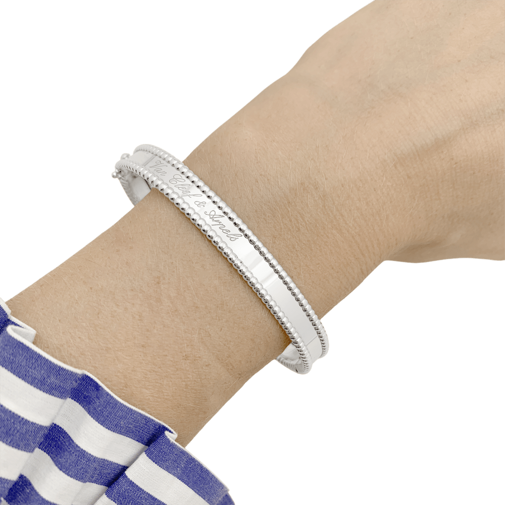 Bracelet Jonc VAN CLEEF & ARPELS "Perlée Signature" en or blanc et perles - Castafiore